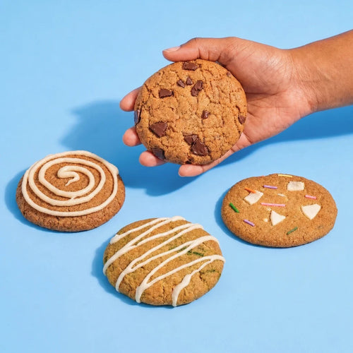 Galletas de proteína bajas en calorías, bajas en azúcar, altas en proteína. Chocolate negro, birthday cake, pie de limón y cinnamon roll.